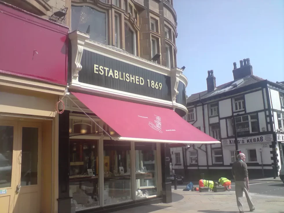 Heritage shopfront with traditional 'Established 1869' lettering