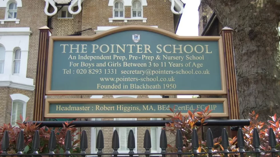 Pointer School — entrance sign with crest
