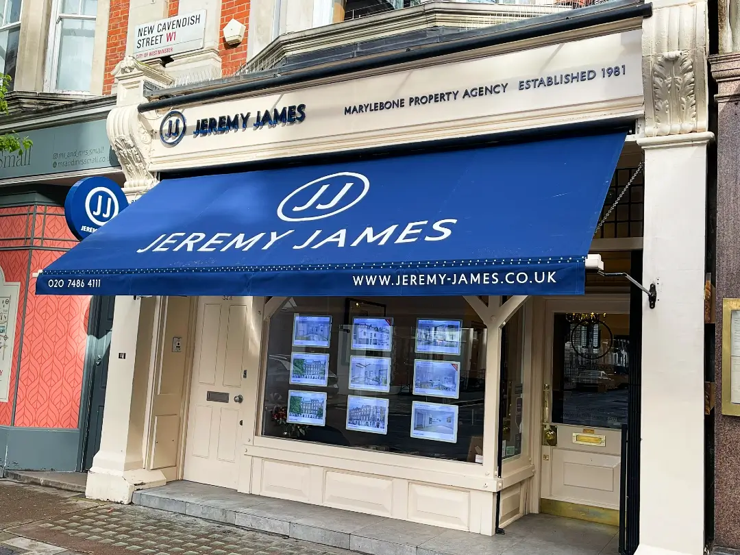 blue awning on high street shop